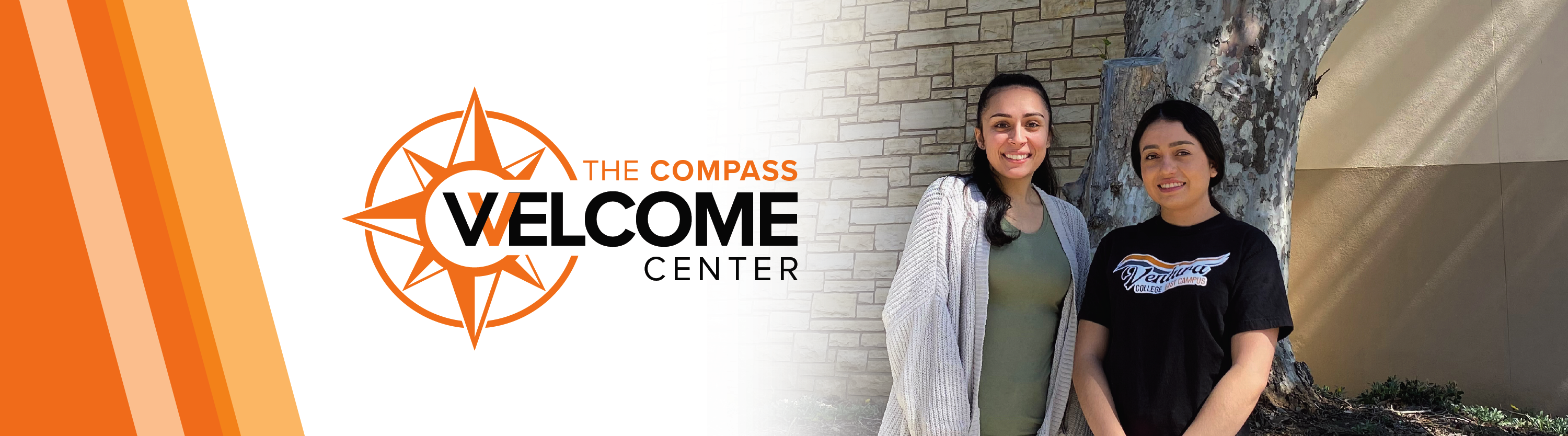 the compass welcome center with photo of two girls standing by a tree