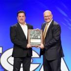 Ventura College football coach Steve Mooshagian, left, accepts the ACCFCA national Coach of the Year award from Wyoming head coach Craig Bohl in San Antonio. PHOTO COURTESY OF ISMAEL RODRIGUEZ