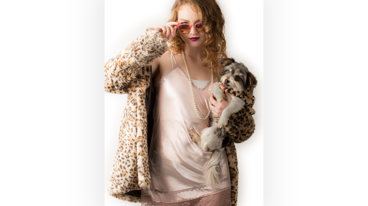 Fashion model with small dog
