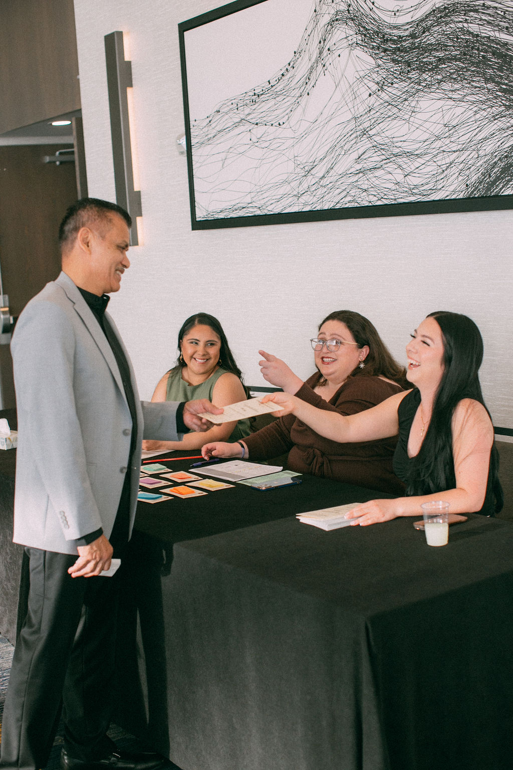 Photo of Staff helping another Staff