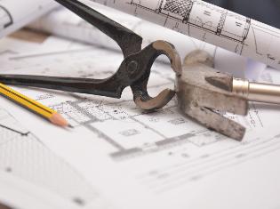 Technical diagram with a hammer, pencils, and other tools. 