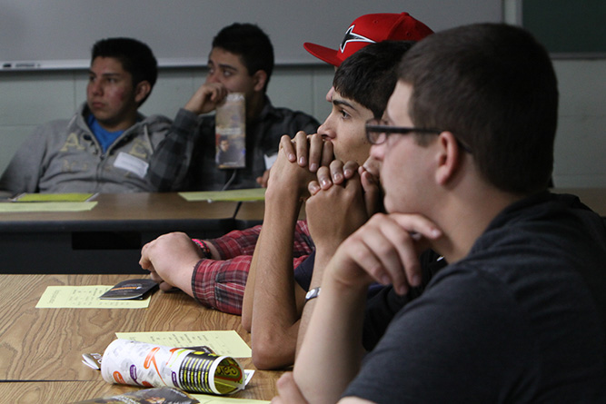 Students listening intently.