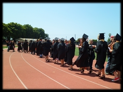 Graduates high five