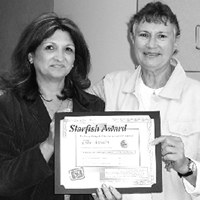 june 2005, Ellie Austin, Library Assistant with Sandy Hajas,