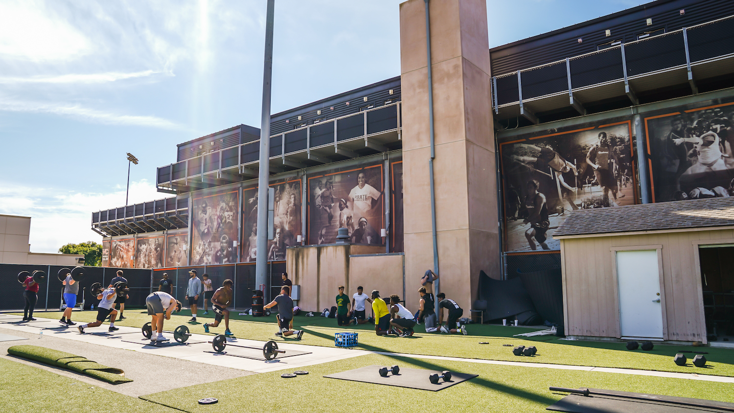 Athletic students outside.