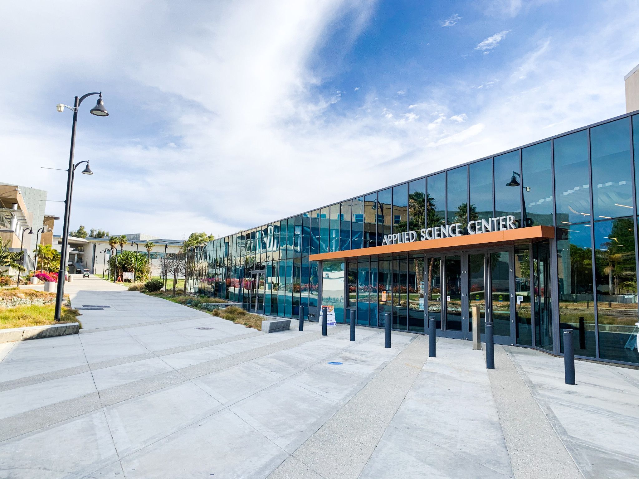 East side of the Applied Science Center Building under a sunny sky