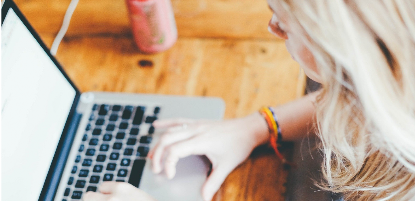 Female Student on Laptop