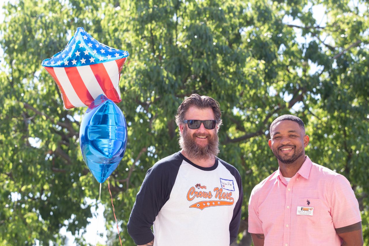 Veterans Resource Center Staff at the Veterans Day BBQ with Balloons