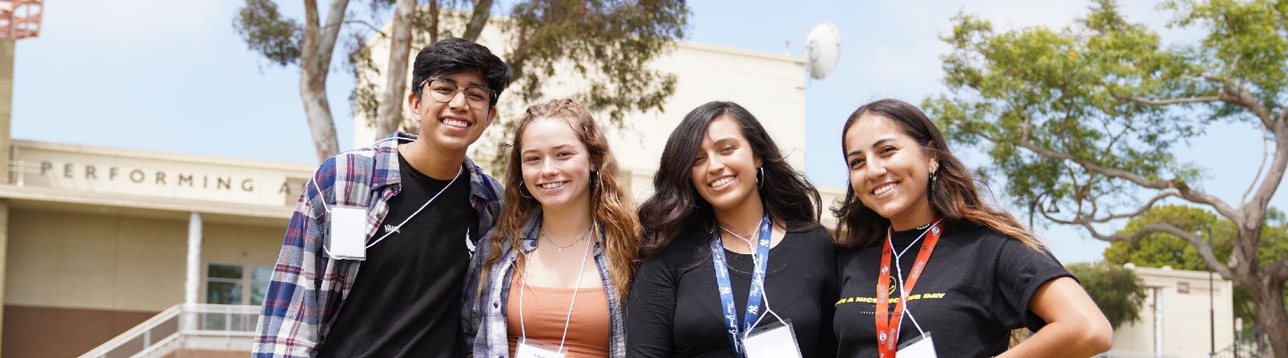 4 ventura college students standing outside