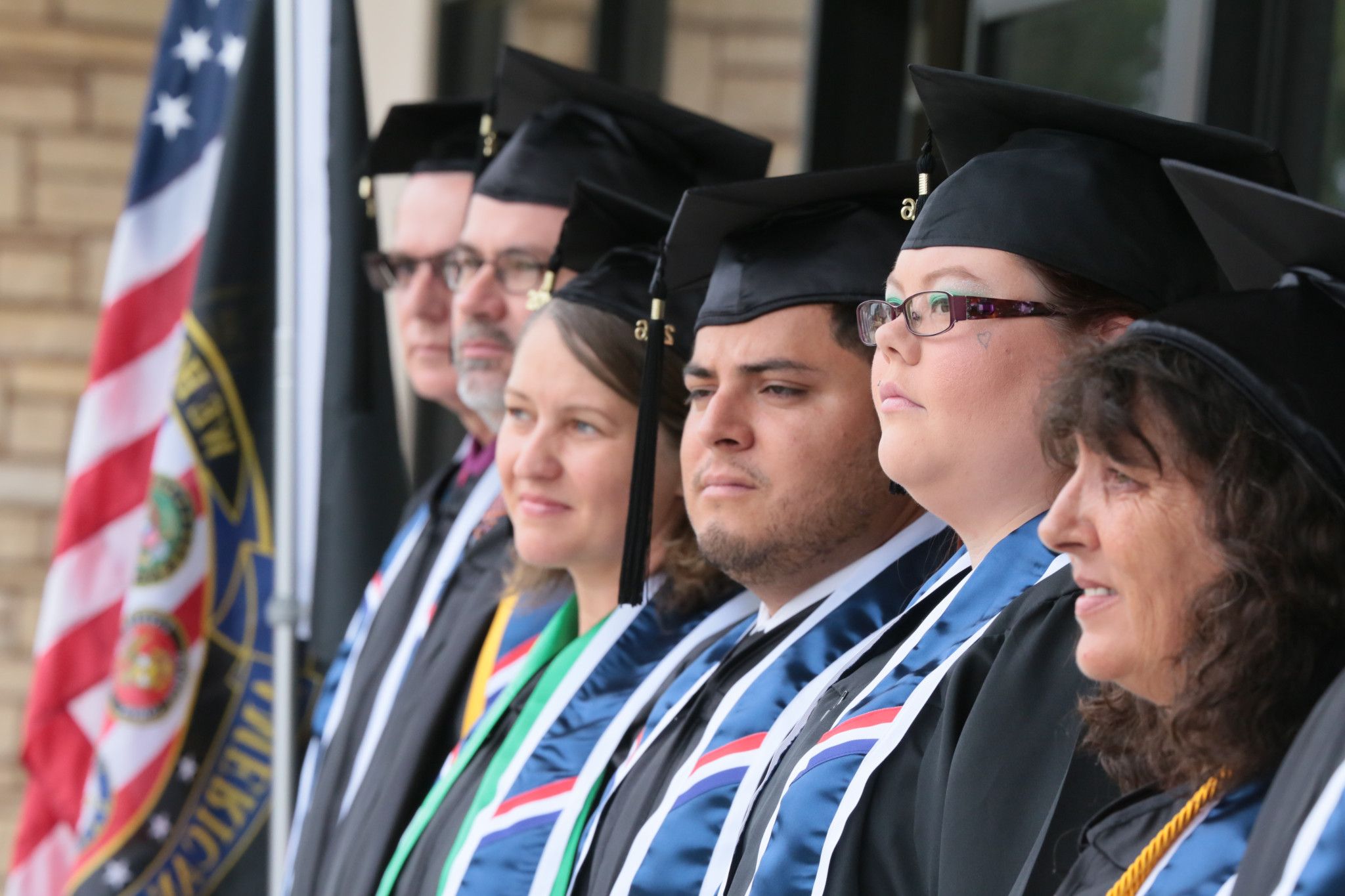 Ventura College graduates celebrate their accomplishments outside the VRC