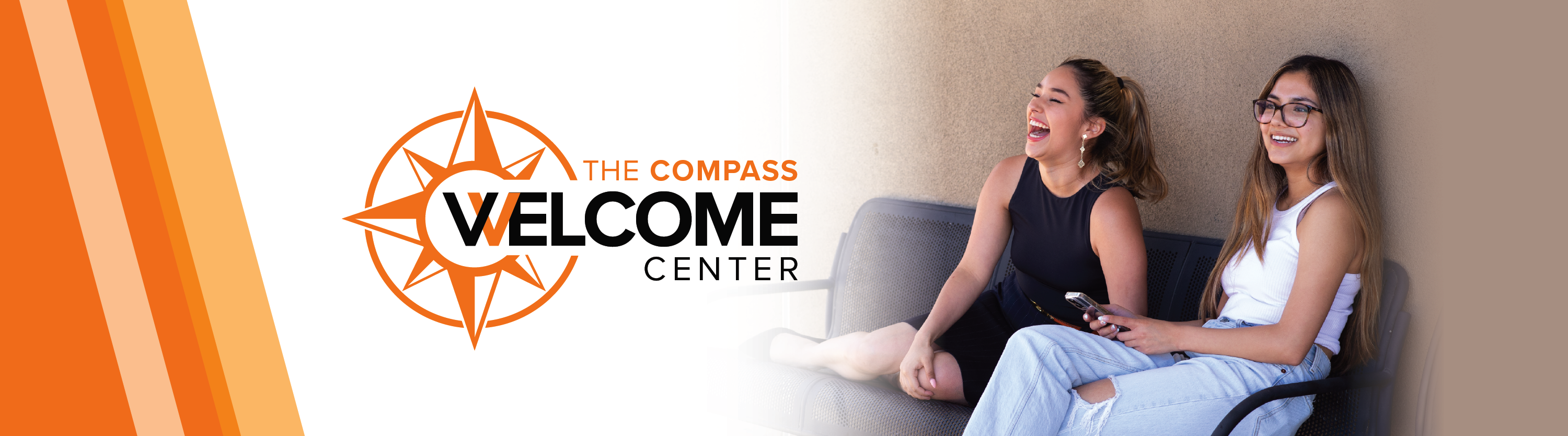 the compass welcome center with photo of two laughing girls