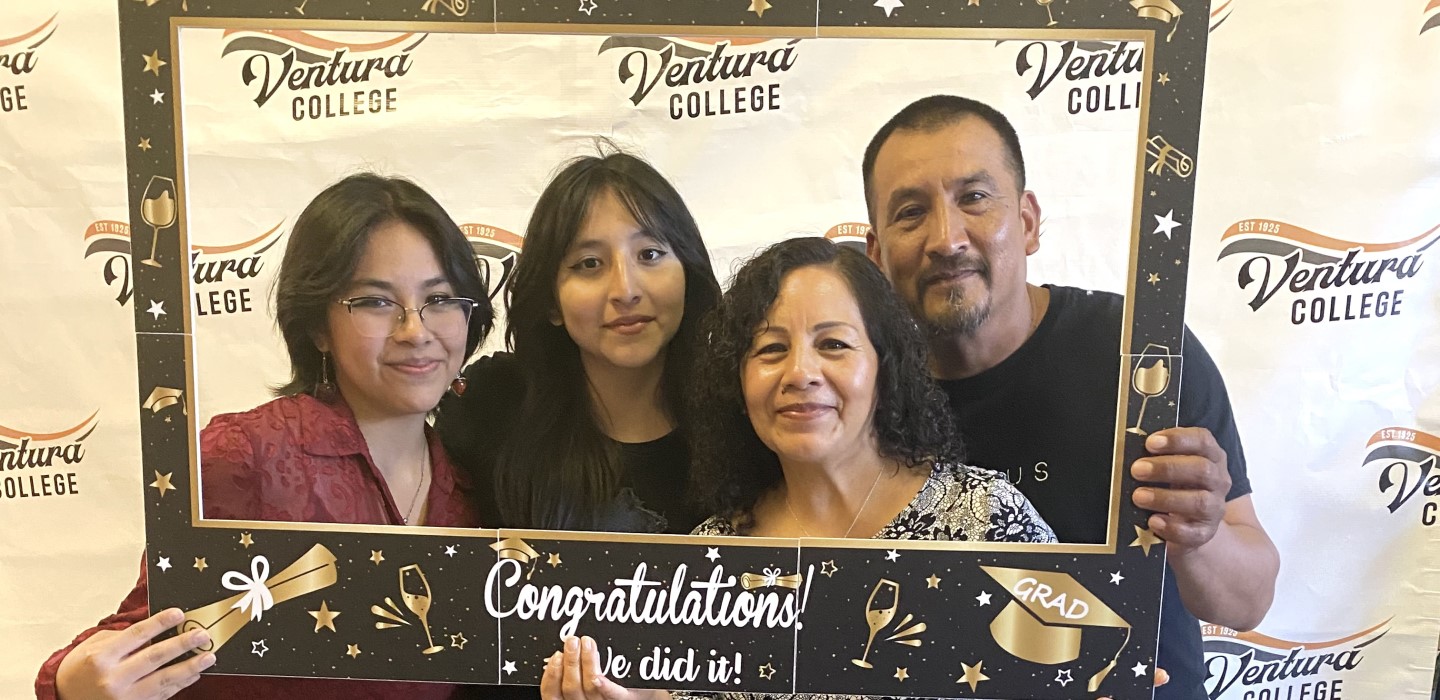 Family honoring ESL graduate