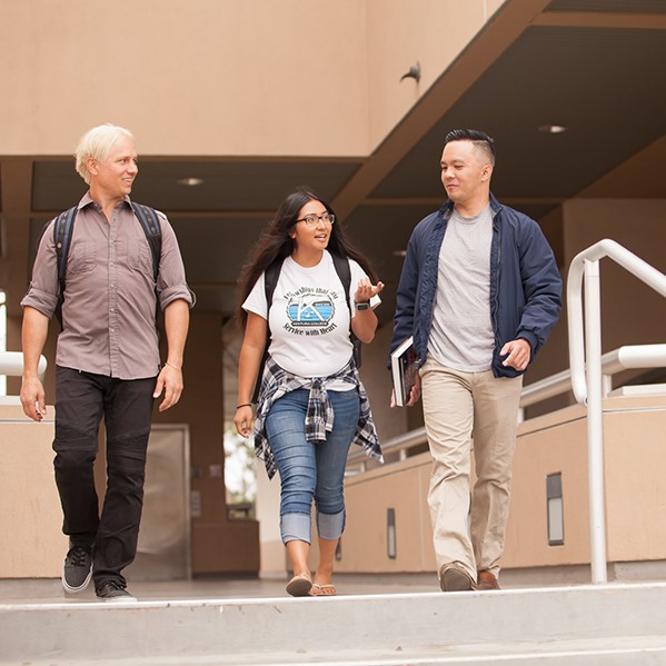 Students walking outside the Science building