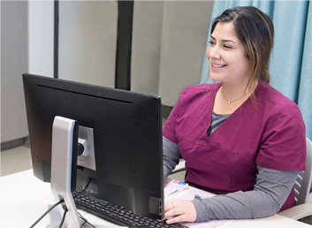 MA Student Working On The Computer