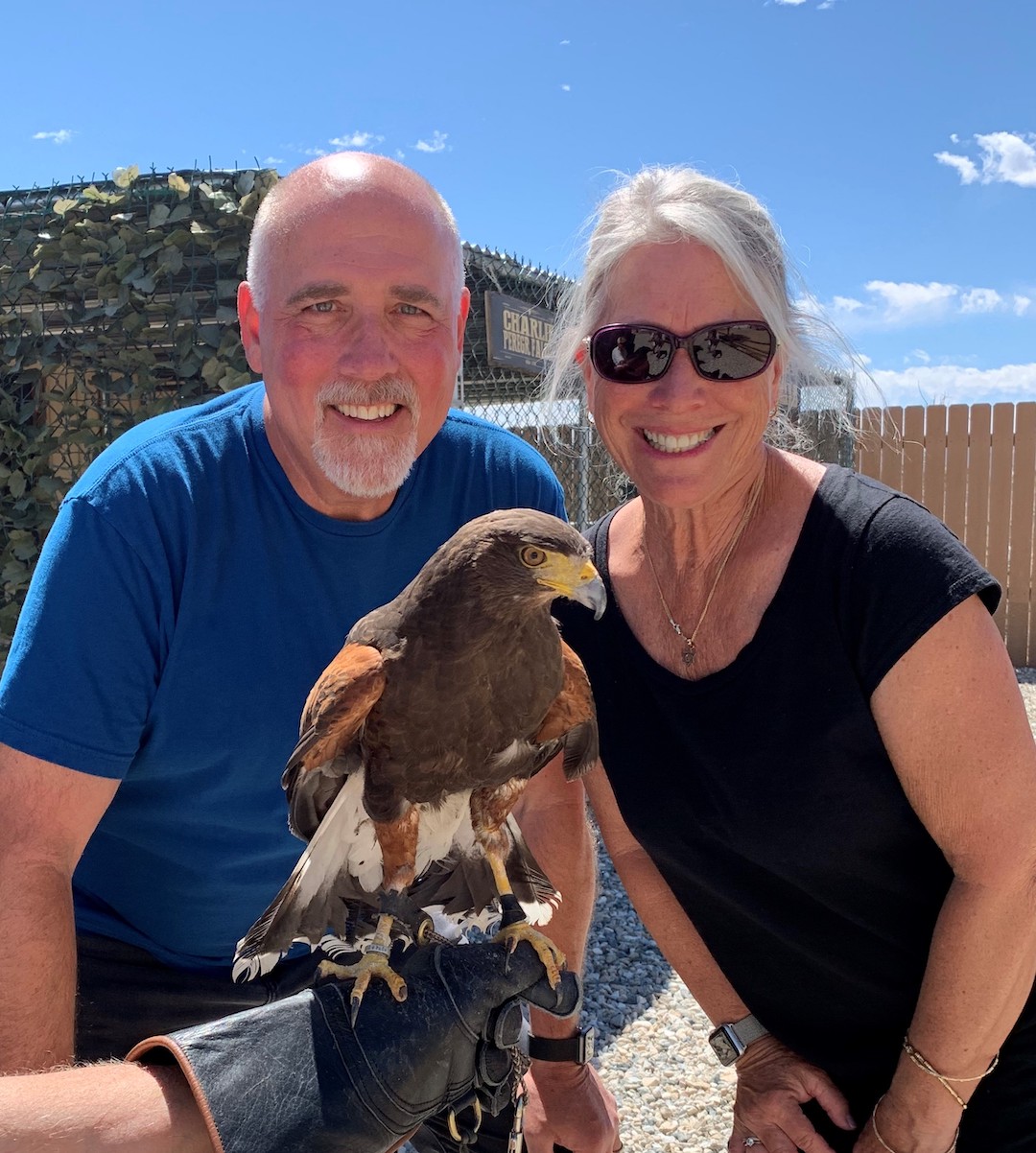 Dan Kumpf and wife with falcon.