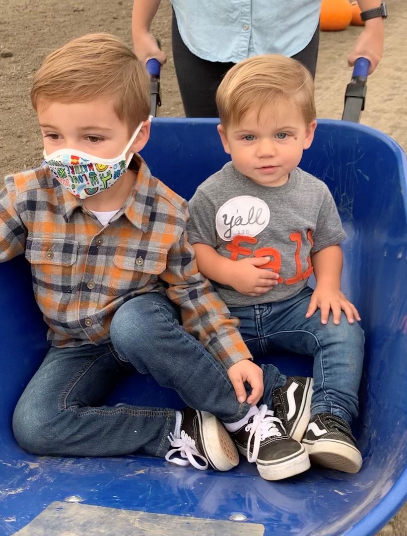 Dan Kumpf's grandchildren in a wheelbarrow. 