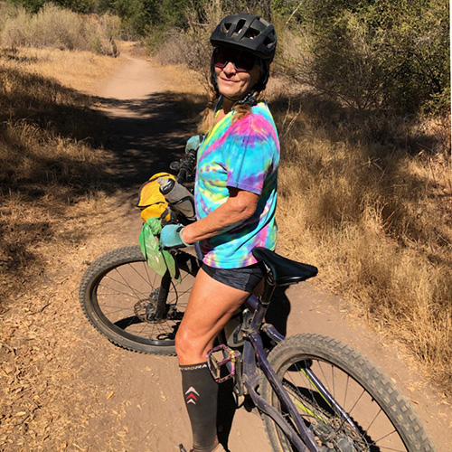 sandy mason riding her mountain bike