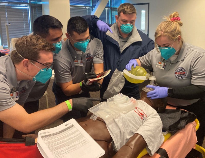 Paramedic Students Performing Advanced CPR