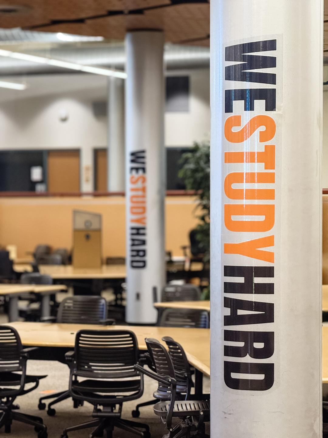 Interior of the Learning Center showing the pillars that say "WE STUDY HARD"