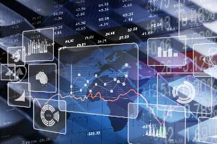 Stocks, charts, and graphs laid over a keyboard and a map of the world.
