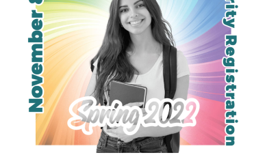 Young female college student holding a notebook and wearing Young female college student holding a notebook and wearing