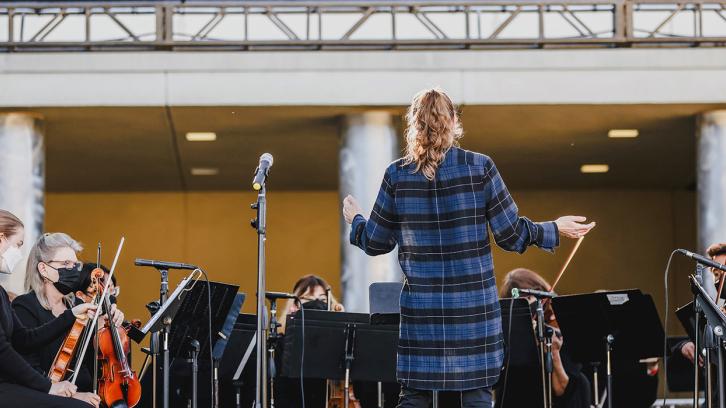 Dr. Ashley Walters conducts the Symphony Orchestra