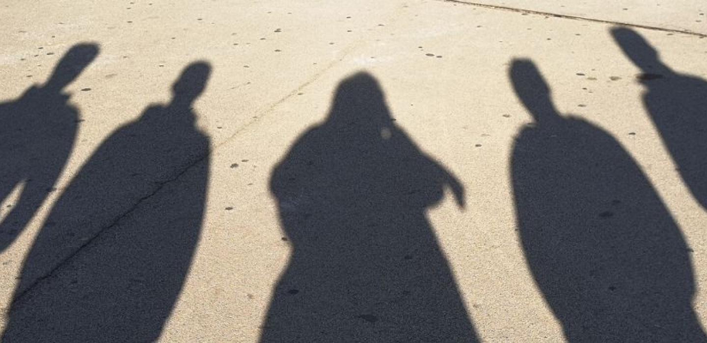 The Shadow of 7 people on the ground