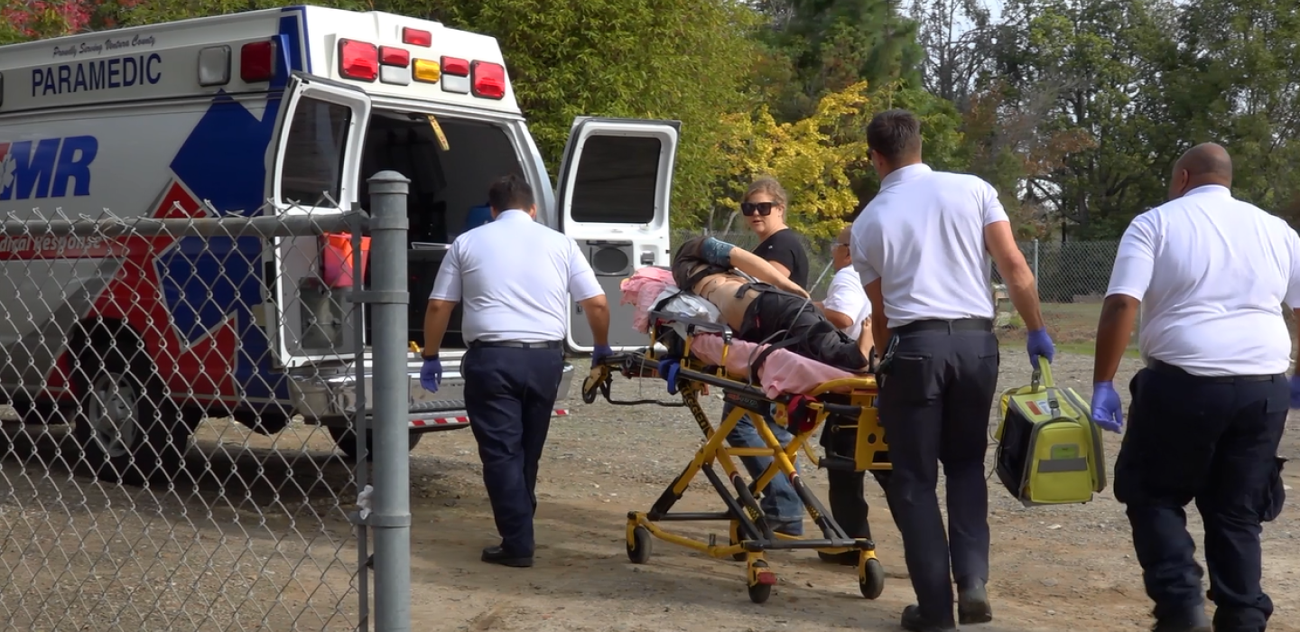Ventura College Paramedic Students transport patient into ambulance