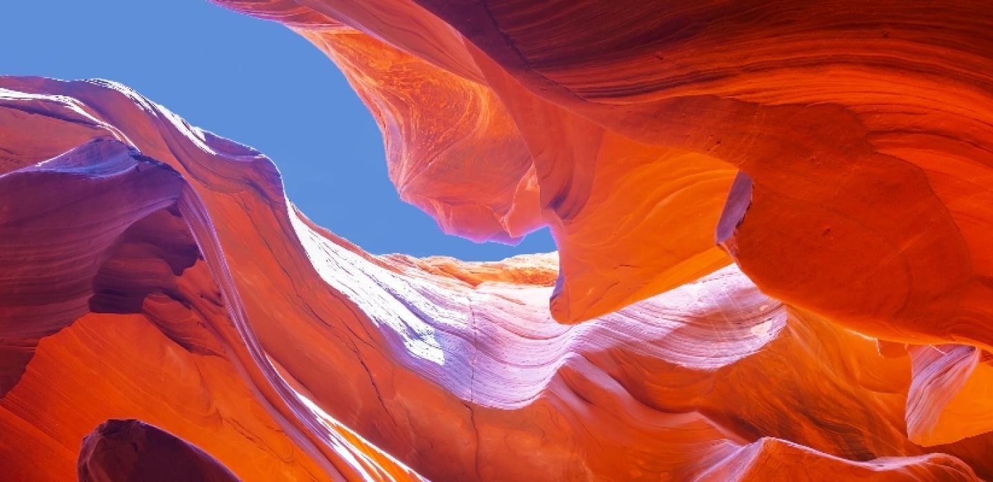 Upward view inside a rock formation. 