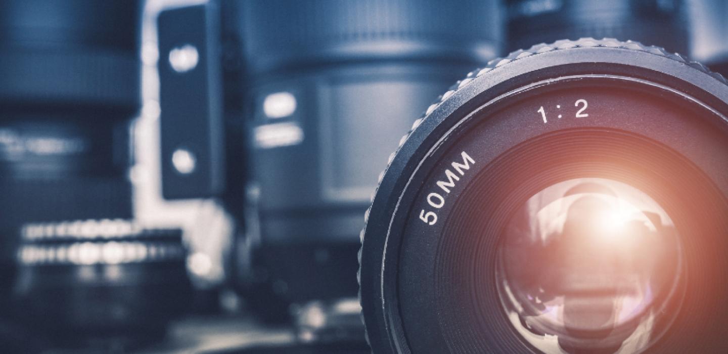 A close up of several camera lenses.