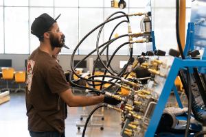 Ventura College Diesel Student in class learning about hydraulics. 